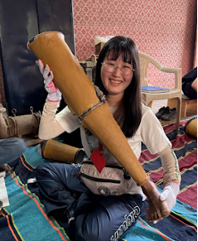 Hina holding artificial limb